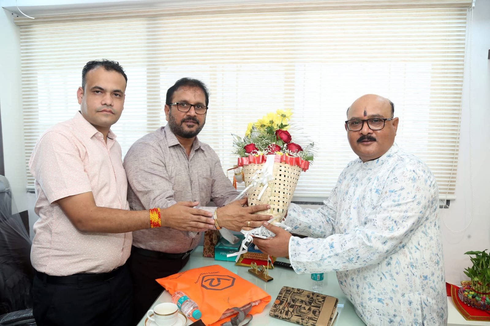 Roadmap Quality presenting a token of appreciation to a client