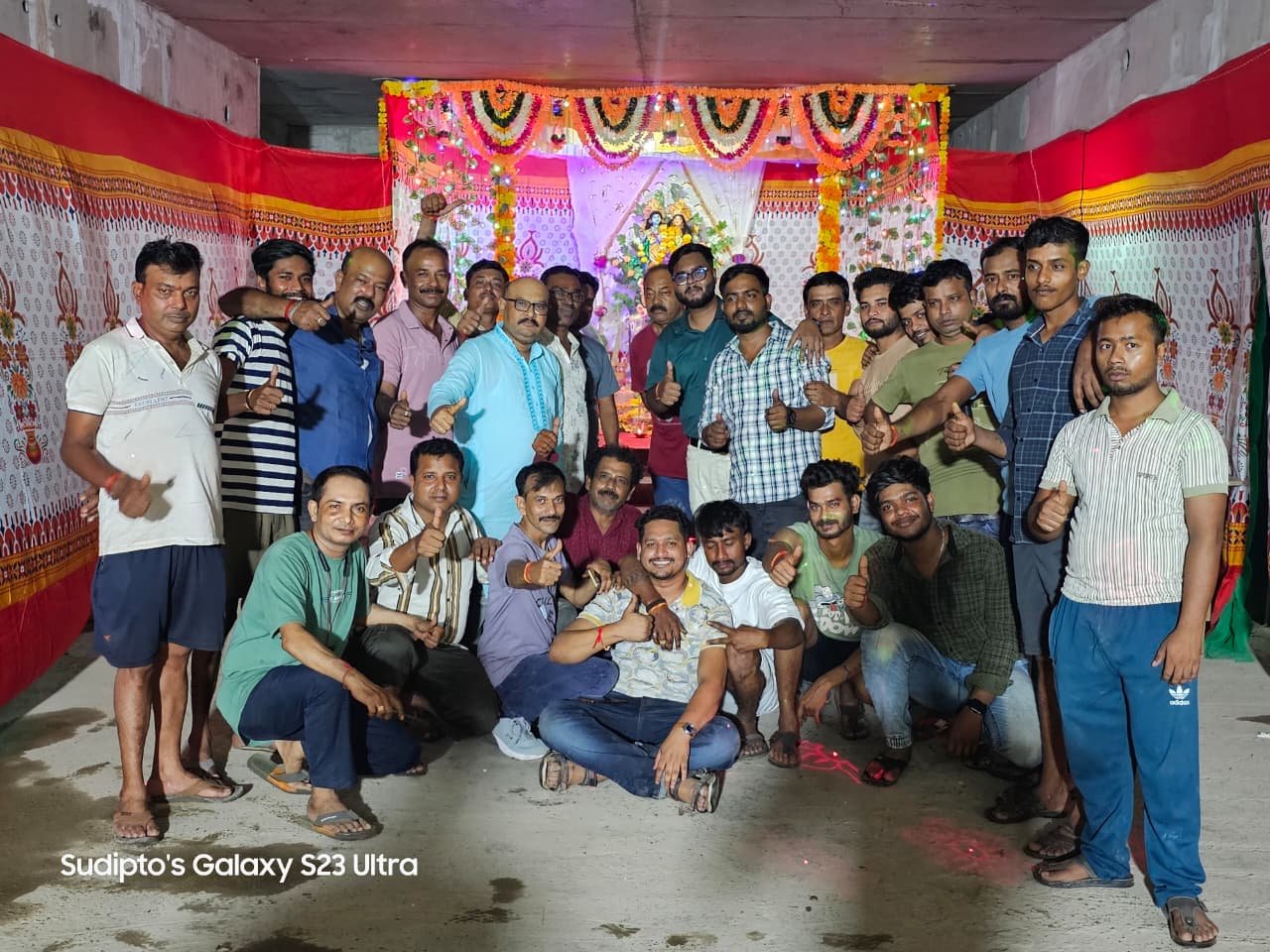 Team offering prayers during Vishwakarma Puja ceremony